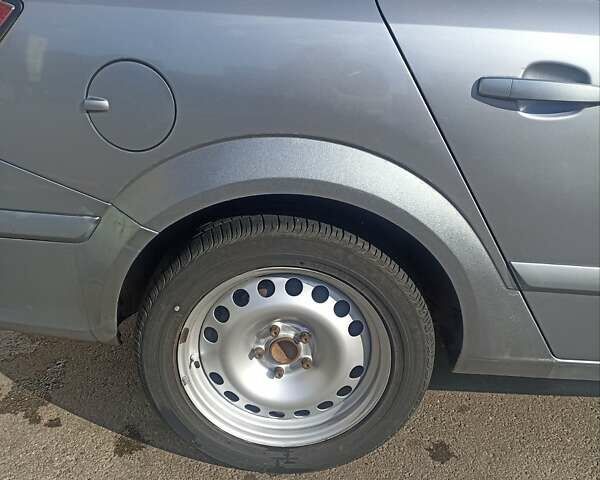 Серый Опель Астра, объемом двигателя 1.6 л и пробегом 230 тыс. км за 5700 $, фото 7 на Automoto.ua