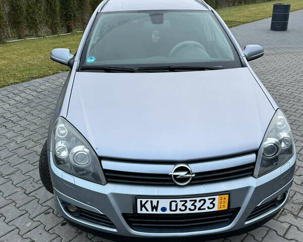 Серый Опель Астра, объемом двигателя 1.8 л и пробегом 211 тыс. км за 4499 $, фото 34 на Automoto.ua