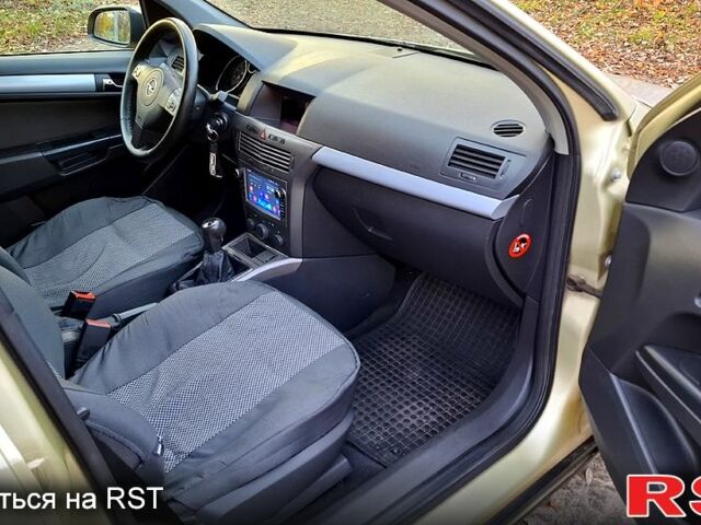 Серый Опель Астра, объемом двигателя 1.6 л и пробегом 244 тыс. км за 5000 $, фото 9 на Automoto.ua