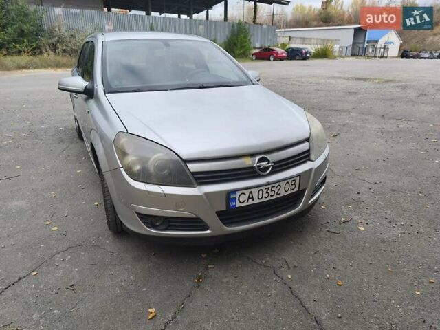 Серый Опель Астра, объемом двигателя 1.8 л и пробегом 349 тыс. км за 3700 $, фото 2 на Automoto.ua