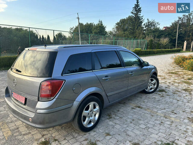 Серый Опель Астра, объемом двигателя 1.8 л и пробегом 210 тыс. км за 4999 $, фото 13 на Automoto.ua
