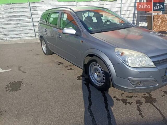 Серый Опель Астра, объемом двигателя 1.6 л и пробегом 230 тыс. км за 5700 $, фото 5 на Automoto.ua