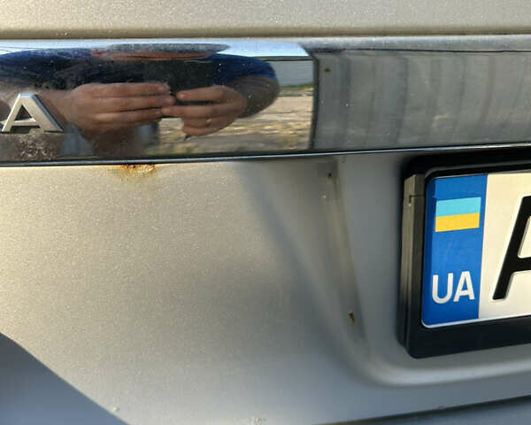 Серый Опель Астра, объемом двигателя 1.6 л и пробегом 190 тыс. км за 5000 $, фото 15 на Automoto.ua