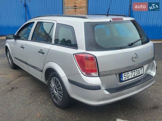 Серый Опель Астра, объемом двигателя 1.7 л и пробегом 250 тыс. км за 2999 $, фото 9 на Automoto.ua