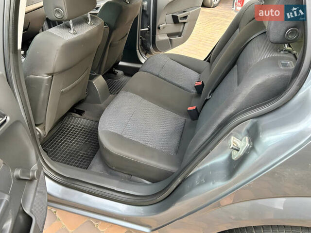 Серый Опель Астра, объемом двигателя 1.6 л и пробегом 238 тыс. км за 6500 $, фото 16 на Automoto.ua