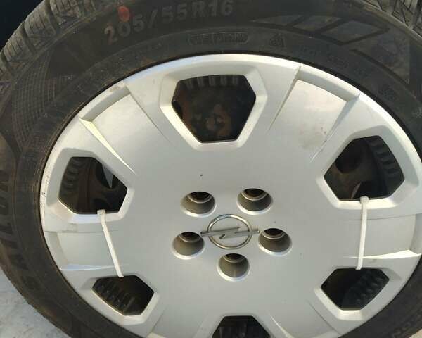 Серый Опель Астра, объемом двигателя 1.7 л и пробегом 225 тыс. км за 5200 $, фото 13 на Automoto.ua