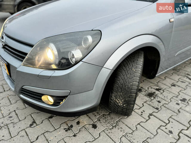 Серый Опель Астра, объемом двигателя 1.8 л и пробегом 211 тыс. км за 4499 $, фото 7 на Automoto.ua