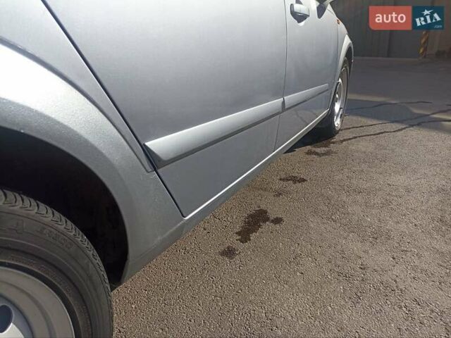 Серый Опель Астра, объемом двигателя 1.6 л и пробегом 230 тыс. км за 5700 $, фото 8 на Automoto.ua