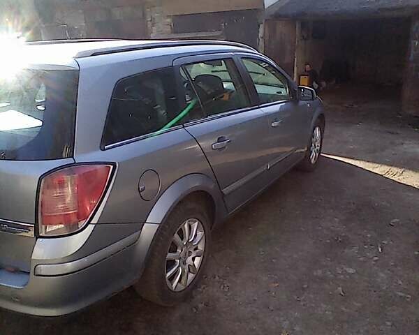 Серый Опель Астра, объемом двигателя 1.6 л и пробегом 390 тыс. км за 4000 $, фото 8 на Automoto.ua