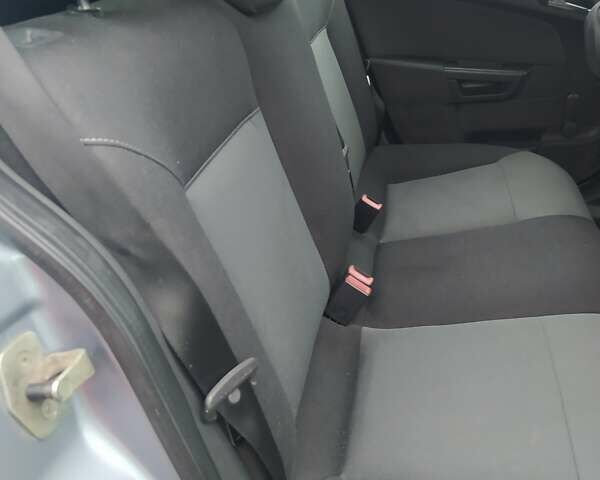 Серый Опель Астра, объемом двигателя 1.6 л и пробегом 265 тыс. км за 5000 $, фото 9 на Automoto.ua