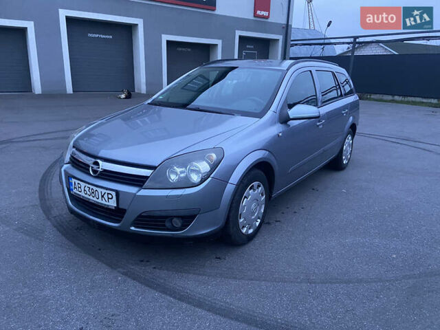 Серый Опель Астра, объемом двигателя 1.6 л и пробегом 227 тыс. км за 5000 $, фото 6 на Automoto.ua