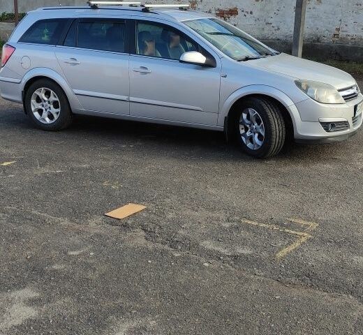 Серый Опель Астра, объемом двигателя 1.9 л и пробегом 176 тыс. км за 4600 $, фото 3 на Automoto.ua