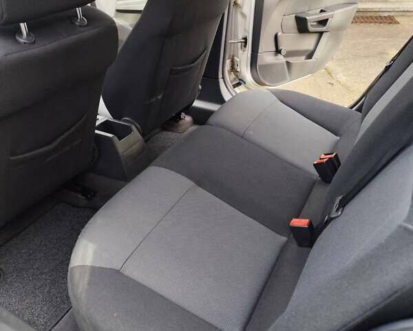 Серый Опель Астра, объемом двигателя 1.8 л и пробегом 286 тыс. км за 5400 $, фото 17 на Automoto.ua