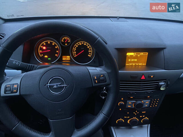 Серый Опель Астра, объемом двигателя 1.6 л и пробегом 227 тыс. км за 5000 $, фото 16 на Automoto.ua