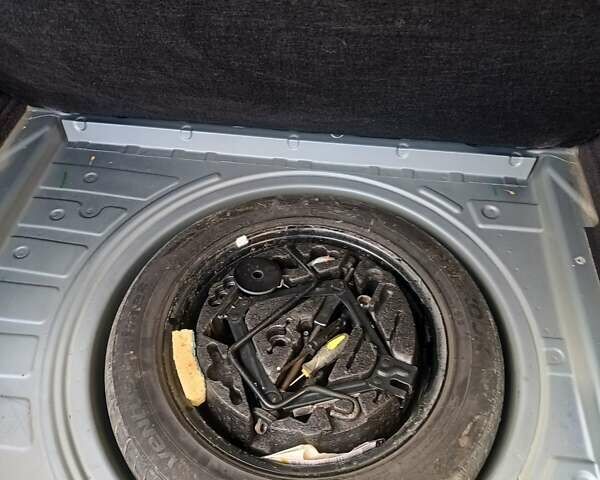 Серый Опель Астра, объемом двигателя 1.4 л и пробегом 250 тыс. км за 4000 $, фото 29 на Automoto.ua