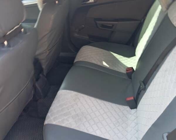 Серый Опель Астра, объемом двигателя 1.7 л и пробегом 296 тыс. км за 5000 $, фото 9 на Automoto.ua