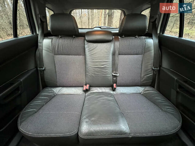 Серый Опель Астра, объемом двигателя 1.8 л и пробегом 300 тыс. км за 5800 $, фото 11 на Automoto.ua