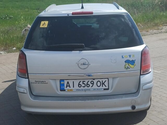 Серый Опель Астра, объемом двигателя 1.8 л и пробегом 420 тыс. км за 4400 $, фото 1 на Automoto.ua