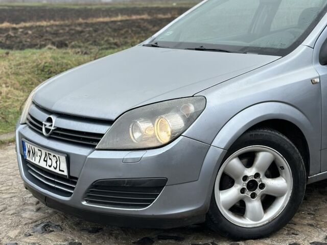 Серый Опель Астра, объемом двигателя 1.7 л и пробегом 305 тыс. км за 1950 $, фото 11 на Automoto.ua