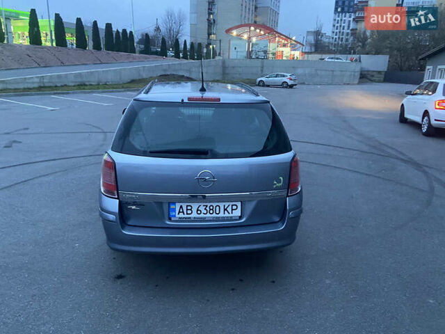 Серый Опель Астра, объемом двигателя 1.6 л и пробегом 227 тыс. км за 5000 $, фото 11 на Automoto.ua