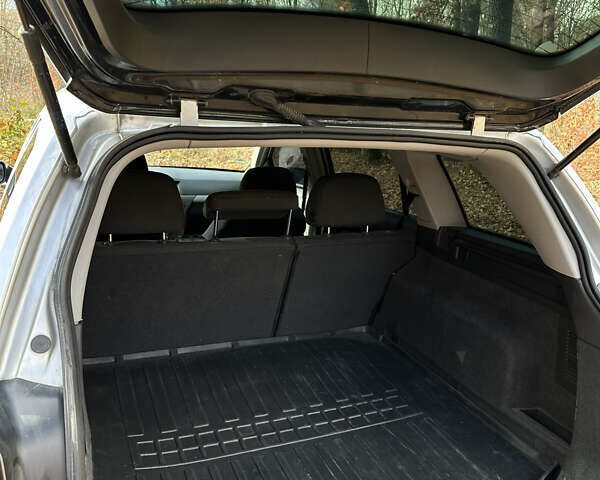 Серый Опель Астра, объемом двигателя 1.7 л и пробегом 324 тыс. км за 4200 $, фото 5 на Automoto.ua