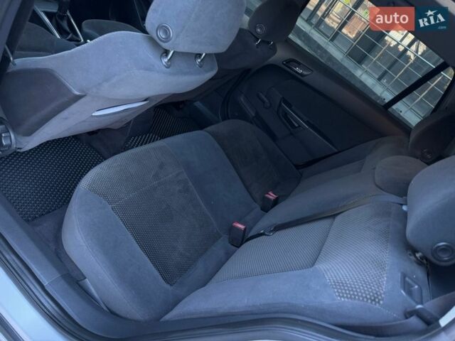 Серый Опель Астра, объемом двигателя 1.8 л и пробегом 194 тыс. км за 6300 $, фото 85 на Automoto.ua