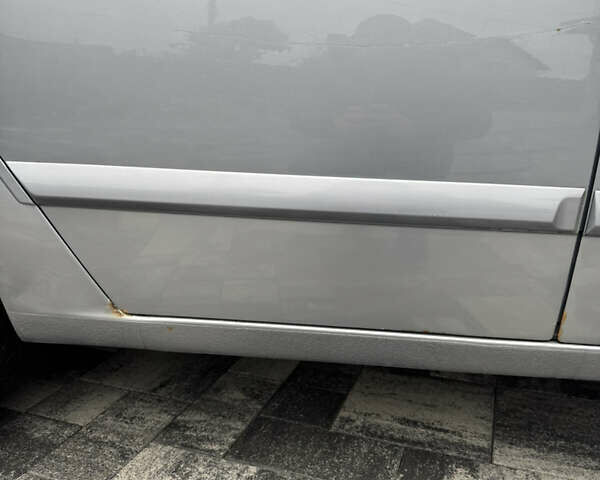 Серый Опель Астра, объемом двигателя 1.6 л и пробегом 276 тыс. км за 4000 $, фото 11 на Automoto.ua