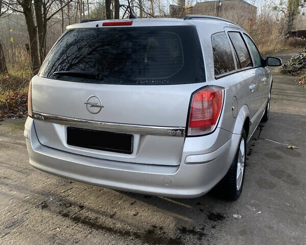 Серый Опель Астра, объемом двигателя 1.3 л и пробегом 360 тыс. км за 2150 $, фото 16 на Automoto.ua