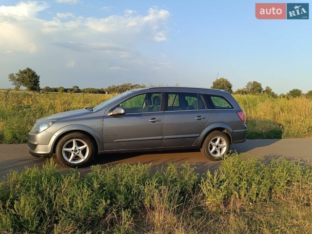 Серый Опель Астра, объемом двигателя 1.6 л и пробегом 239 тыс. км за 5100 $, фото 2 на Automoto.ua