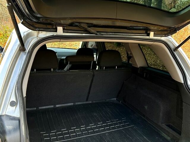 Серый Опель Астра, объемом двигателя 1.7 л и пробегом 324 тыс. км за 4200 $, фото 5 на Automoto.ua