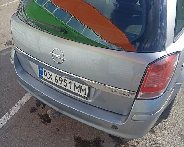 Серый Опель Астра, объемом двигателя 1.6 л и пробегом 230 тыс. км за 5700 $, фото 3 на Automoto.ua