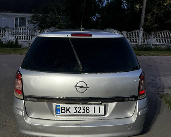 Серый Опель Астра, объемом двигателя 1.9 л и пробегом 350 тыс. км за 3099 $, фото 4 на Automoto.ua