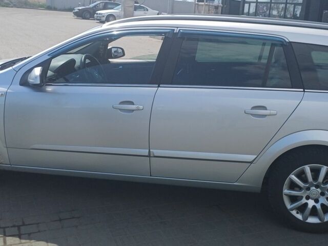 Серый Опель Астра, объемом двигателя 1.8 л и пробегом 420 тыс. км за 4400 $, фото 2 на Automoto.ua