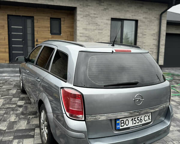 Серый Опель Астра, объемом двигателя 1.6 л и пробегом 276 тыс. км за 4000 $, фото 5 на Automoto.ua