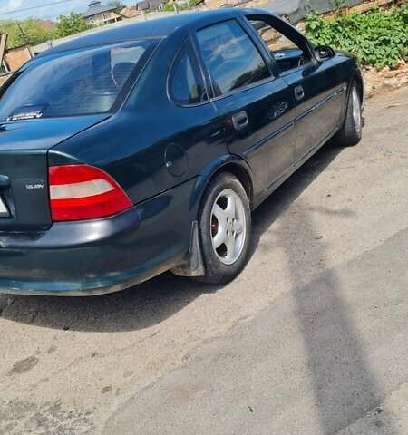 Серый Опель Астра, объемом двигателя 2 л и пробегом 178 тыс. км за 2550 $, фото 7 на Automoto.ua