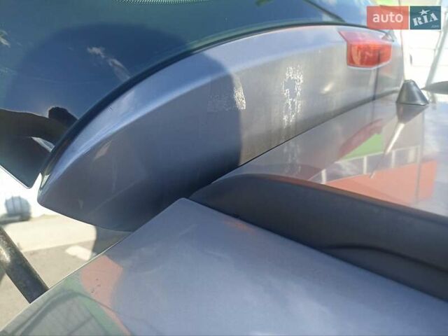 Серый Опель Астра, объемом двигателя 1.6 л и пробегом 230 тыс. км за 5700 $, фото 14 на Automoto.ua