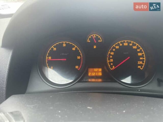 Серый Опель Астра, объемом двигателя 1.25 л и пробегом 212 тыс. км за 5000 $, фото 7 на Automoto.ua