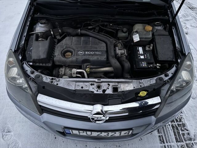 Серый Опель Астра, объемом двигателя 1.7 л и пробегом 370 тыс. км за 2819 $, фото 13 на Automoto.ua