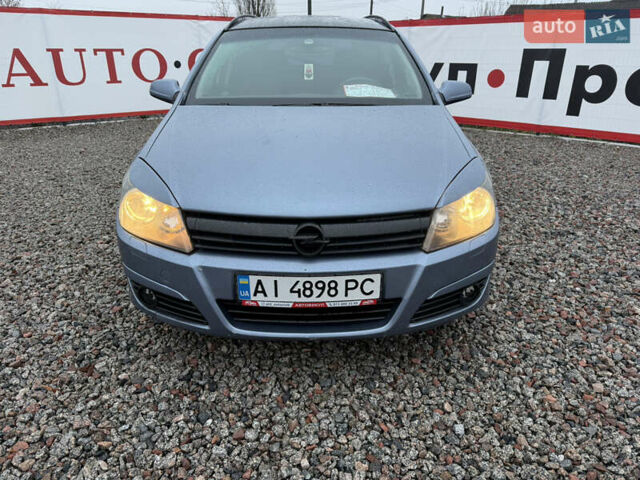 Серый Опель Астра, объемом двигателя 1.6 л и пробегом 333 тыс. км за 3300 $, фото 6 на Automoto.ua