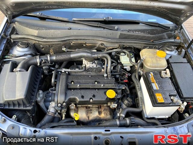 Серый Опель Астра, объемом двигателя 1.4 л и пробегом 243 тыс. км за 5200 $, фото 12 на Automoto.ua