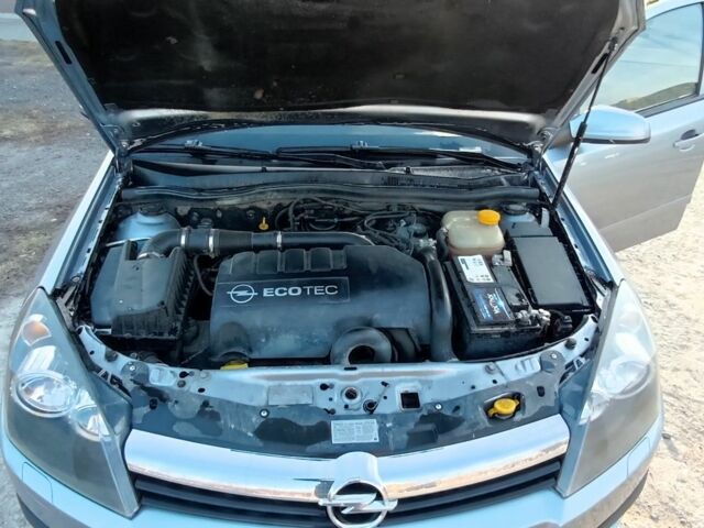 Серый Опель Астра, объемом двигателя 1.3 л и пробегом 500 тыс. км за 5250 $, фото 4 на Automoto.ua