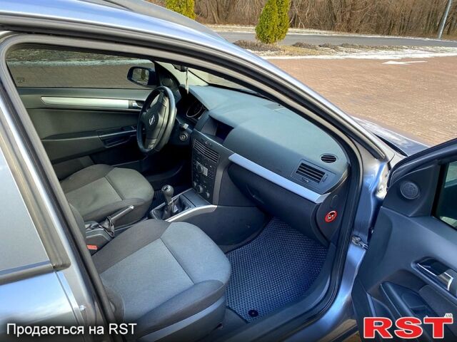 Серый Опель Астра, объемом двигателя 1.4 л и пробегом 243 тыс. км за 5200 $, фото 5 на Automoto.ua