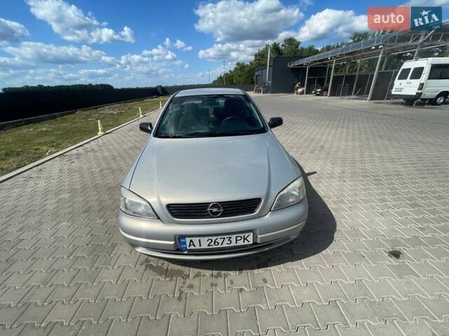 Серый Опель Астра, объемом двигателя 1.4 л и пробегом 320 тыс. км за 4000 $, фото 4 на Automoto.ua