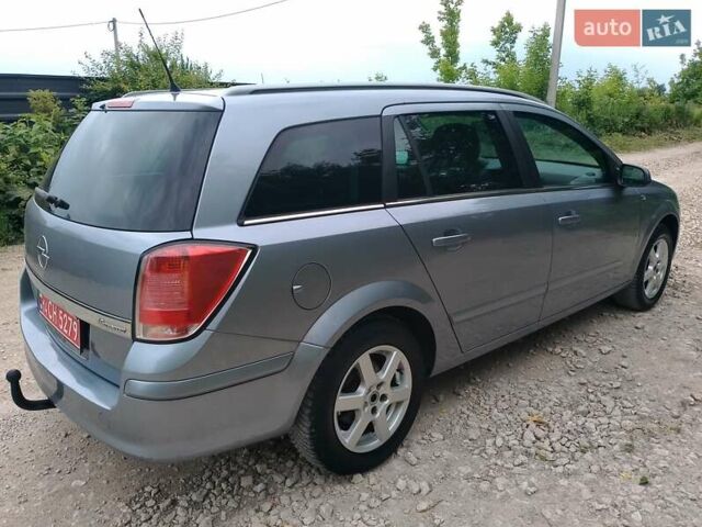 Серый Опель Астра, объемом двигателя 1.6 л и пробегом 206 тыс. км за 5000 $, фото 7 на Automoto.ua