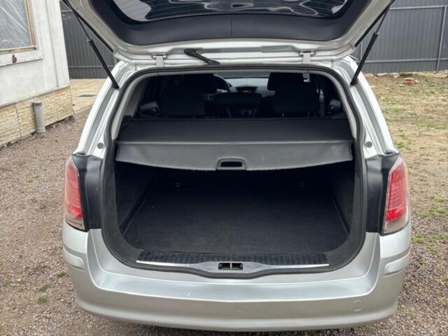 Серый Опель Астра, объемом двигателя 1.6 л и пробегом 245 тыс. км за 5450 $, фото 3 на Automoto.ua