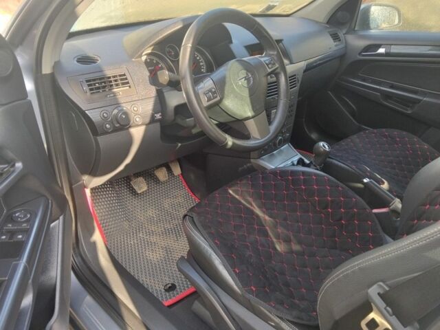 Серый Опель Астра, объемом двигателя 1 л и пробегом 240 тыс. км за 4200 $, фото 4 на Automoto.ua