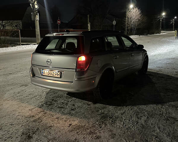 Серый Опель Астра, объемом двигателя 1.4 л и пробегом 280 тыс. км за 4900 $, фото 3 на Automoto.ua