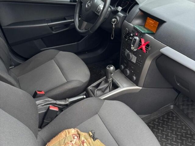 Серый Опель Астра, объемом двигателя 1.6 л и пробегом 245 тыс. км за 5450 $, фото 5 на Automoto.ua