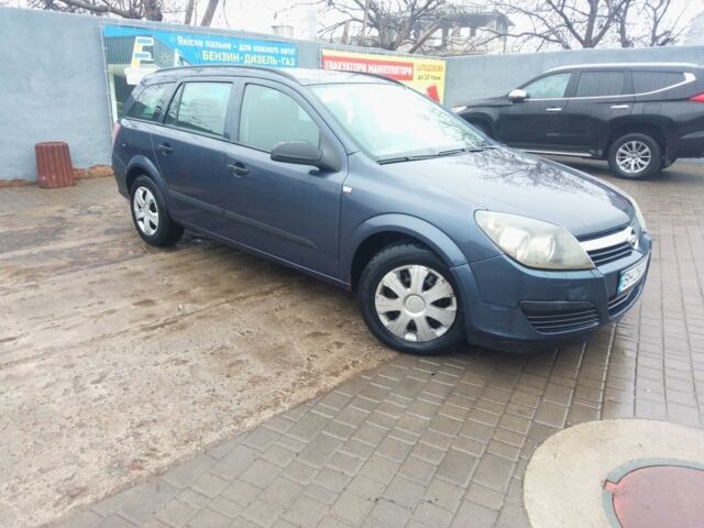 Серый Опель Астра, объемом двигателя 1.2 л и пробегом 425 тыс. км за 4200 $, фото 3 на Automoto.ua