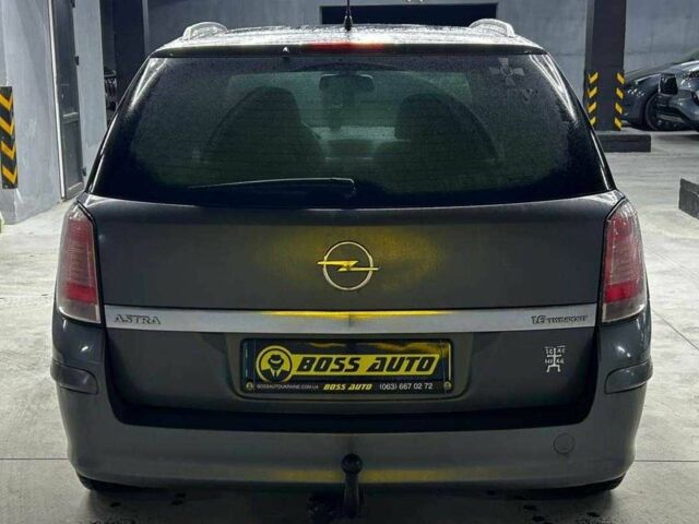 Серый Опель Астра, объемом двигателя 1.6 л и пробегом 249 тыс. км за 5700 $, фото 4 на Automoto.ua